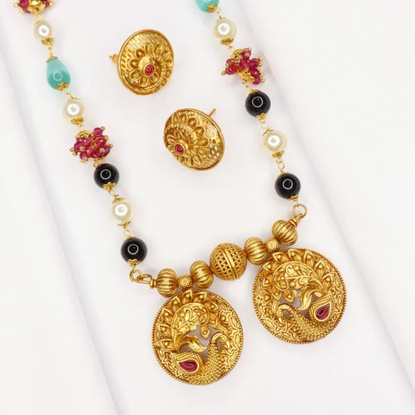 Base Metal: Brass, Beads, Kundan & Pearl Stone Plating: Micro Gold Plated with Matte finish Stone Type: Artificial Stones Sizing: 36 in long Type: Fancy Mangalsutra with Earrings As Per Image Free Shipping In Maharashtra Delivery time: 3 to 4 Working Day’s